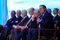 In front of a backdrop of screens showing the new mission presidents and companions participating remotely at home, the First Presidency and Quorum of the Twelve Apostles pause for a photo together before the start of the second day of the 2021 Seminar for New Mission Leaders on Friday, June 25, 2021, in the Conference Center Theater.