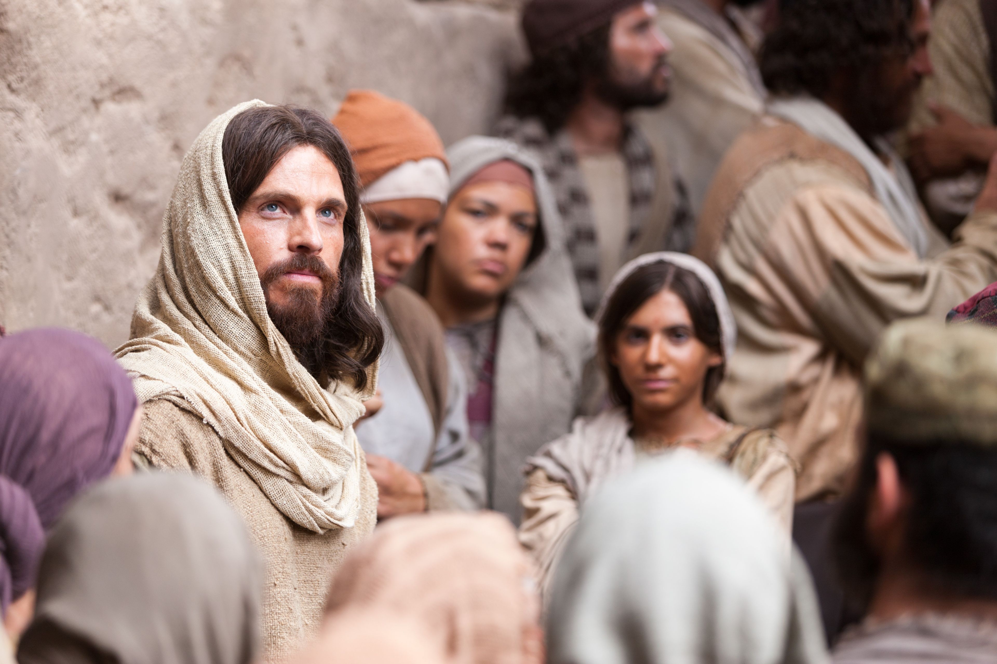 Jesus teaches a group of people, “He that believeth on me hath everlasting life.”