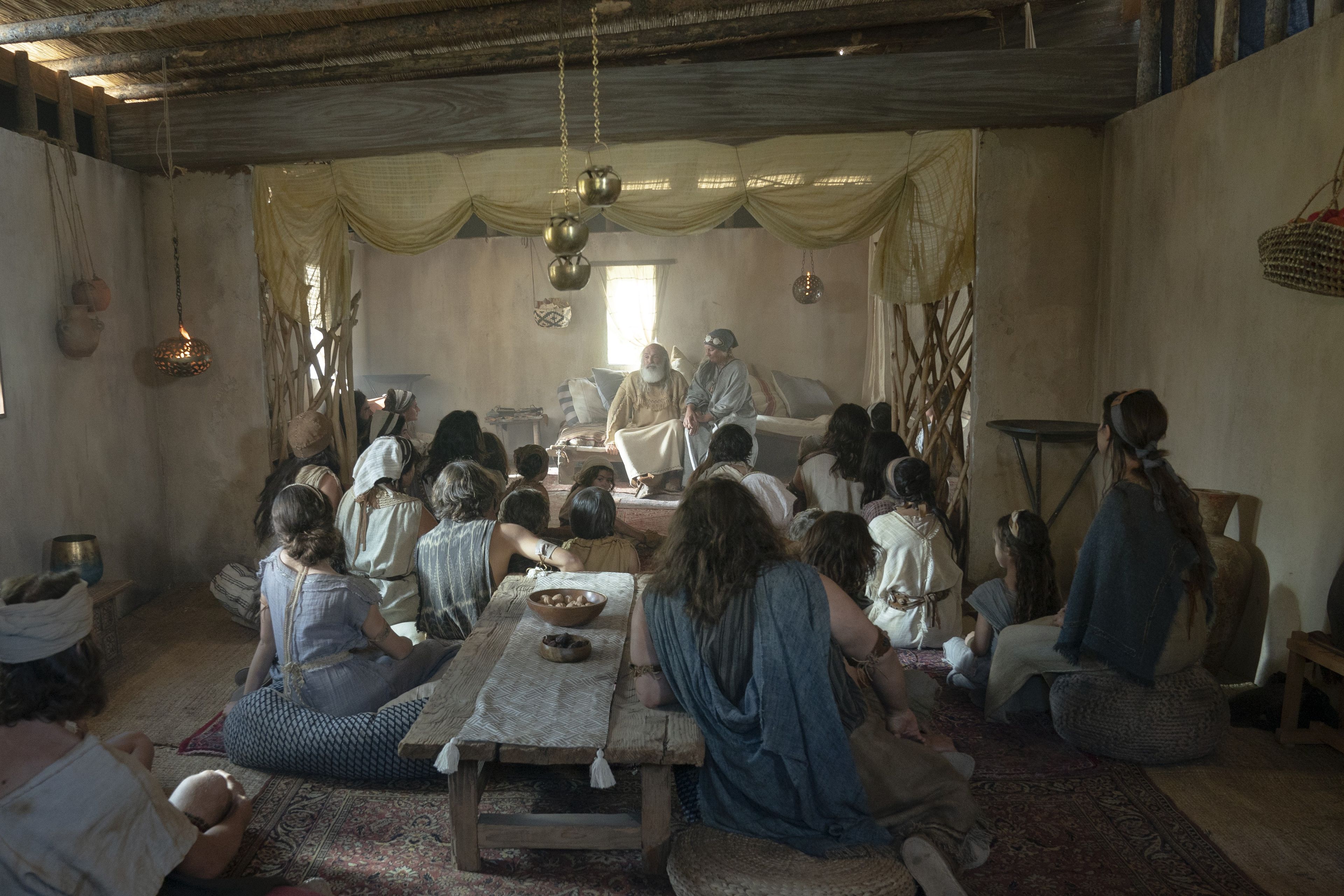 Lehi teaches his family in his home.