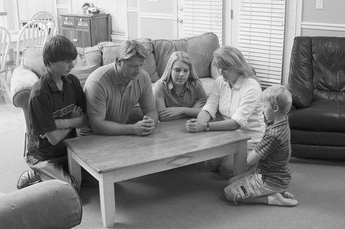 family praying