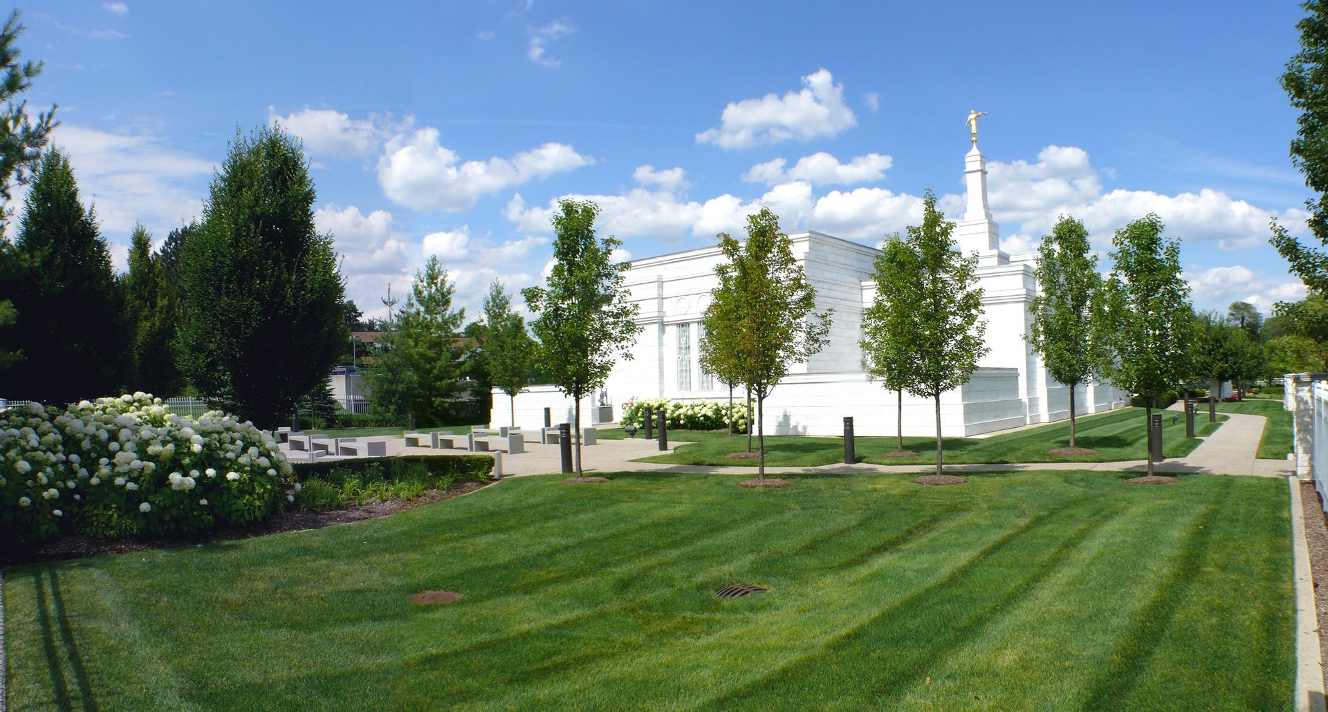 A landscape view of the back of the Detroit Michigan Temple and temple grounds.