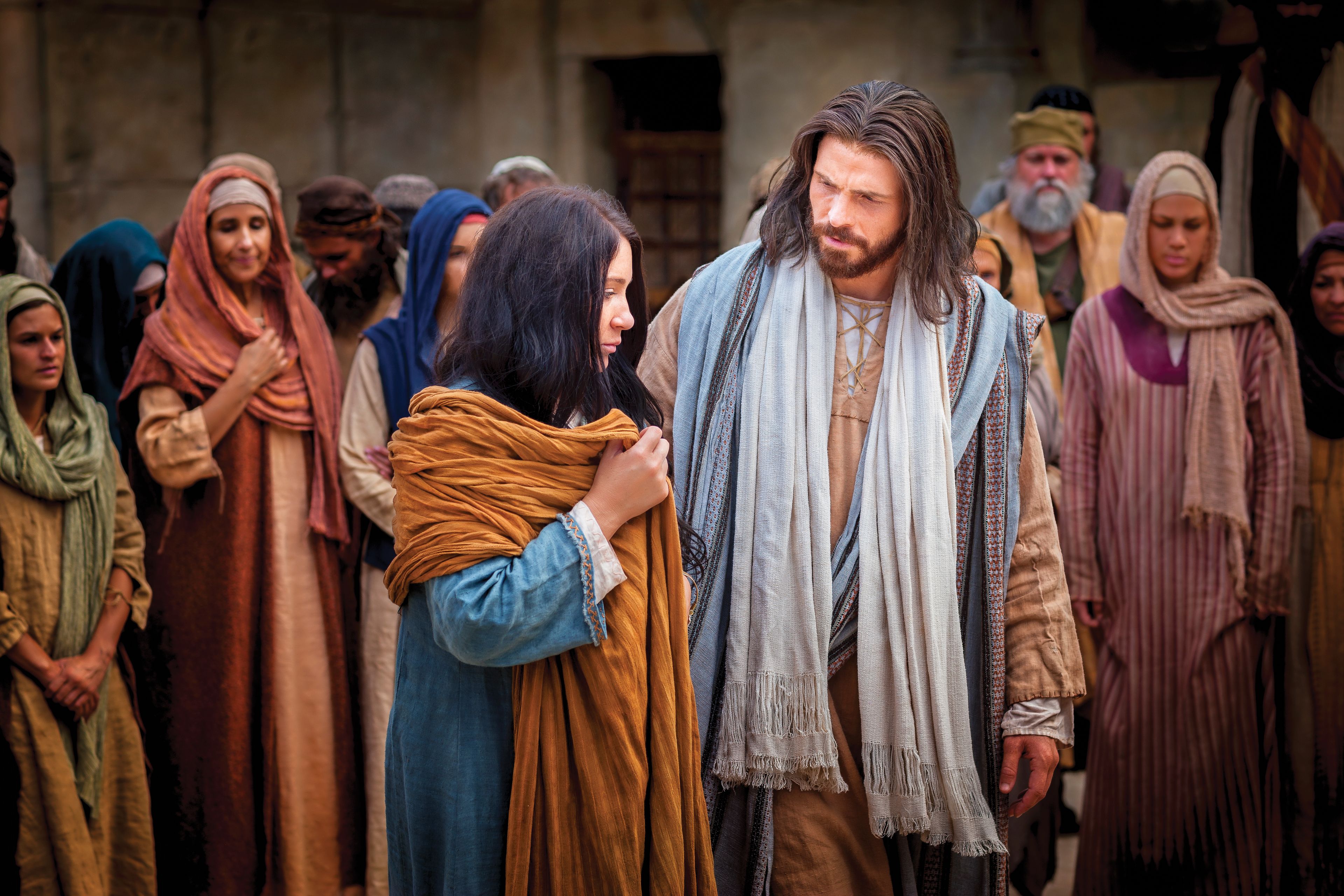 Christ standing beside the woman who was taken in adultery.