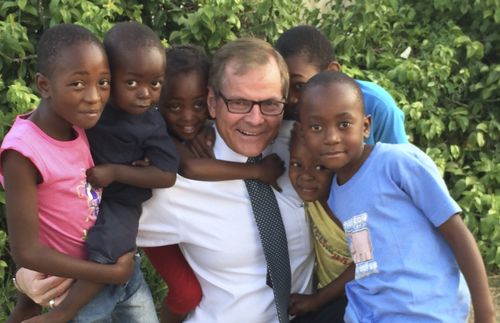 Elder Stevenson with African children
