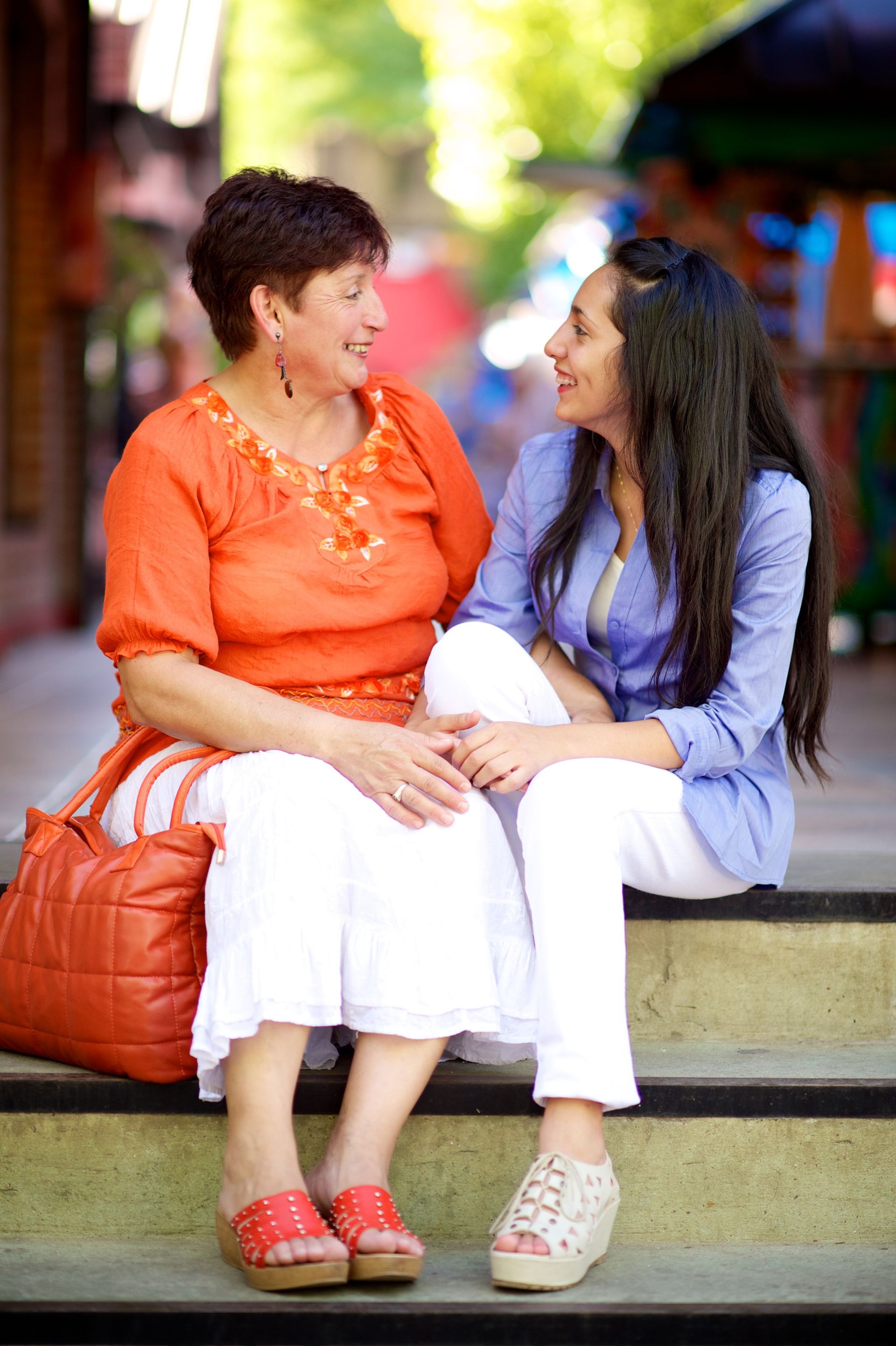 A mother and daughter from Argentina talking together.  