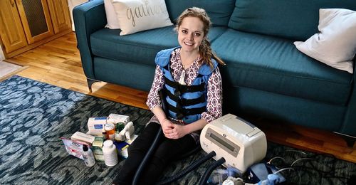 young woman with medical equipment