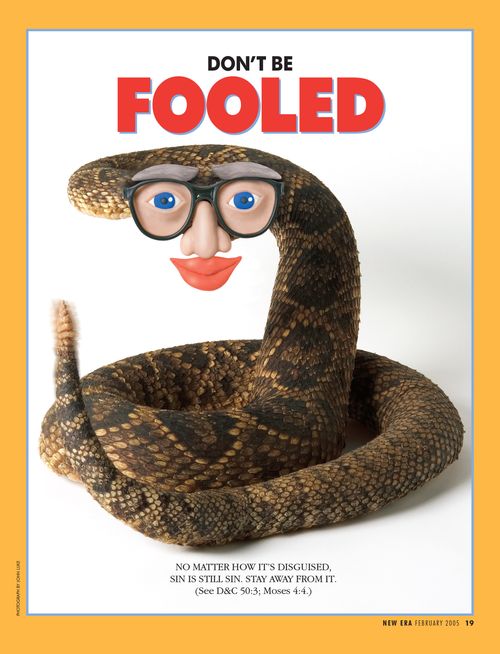 A conceptual image of a rattlesnake wearing a human face mask, paired with the words “Don't Be Fooled.”