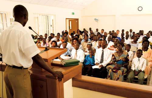 man speaking in church