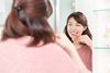 Woman brushing her teeth