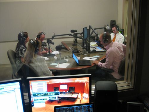 Screen capture from the program "Faith in Action."  Five people sitting around a table making a radio show.  Episode 4: Humanitarian in Guatemala.