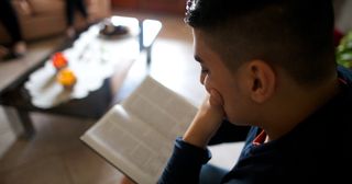 person studying the scriptures