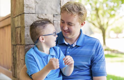 boy talking with his father