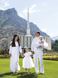 young family with Provo Utah Temple in background