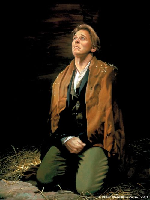 A painting by Liz Lemon Swindle of Joseph Smith in Liberty Jail kneeling and looking upwards with tears running down his face.