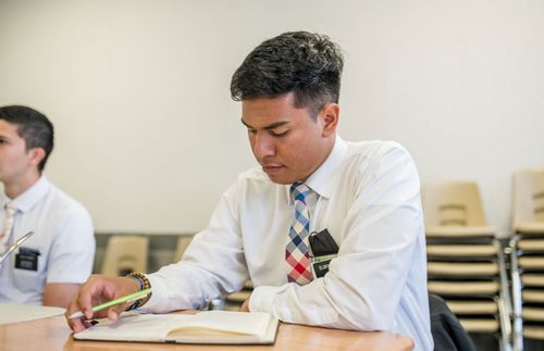 missionaries writing notes