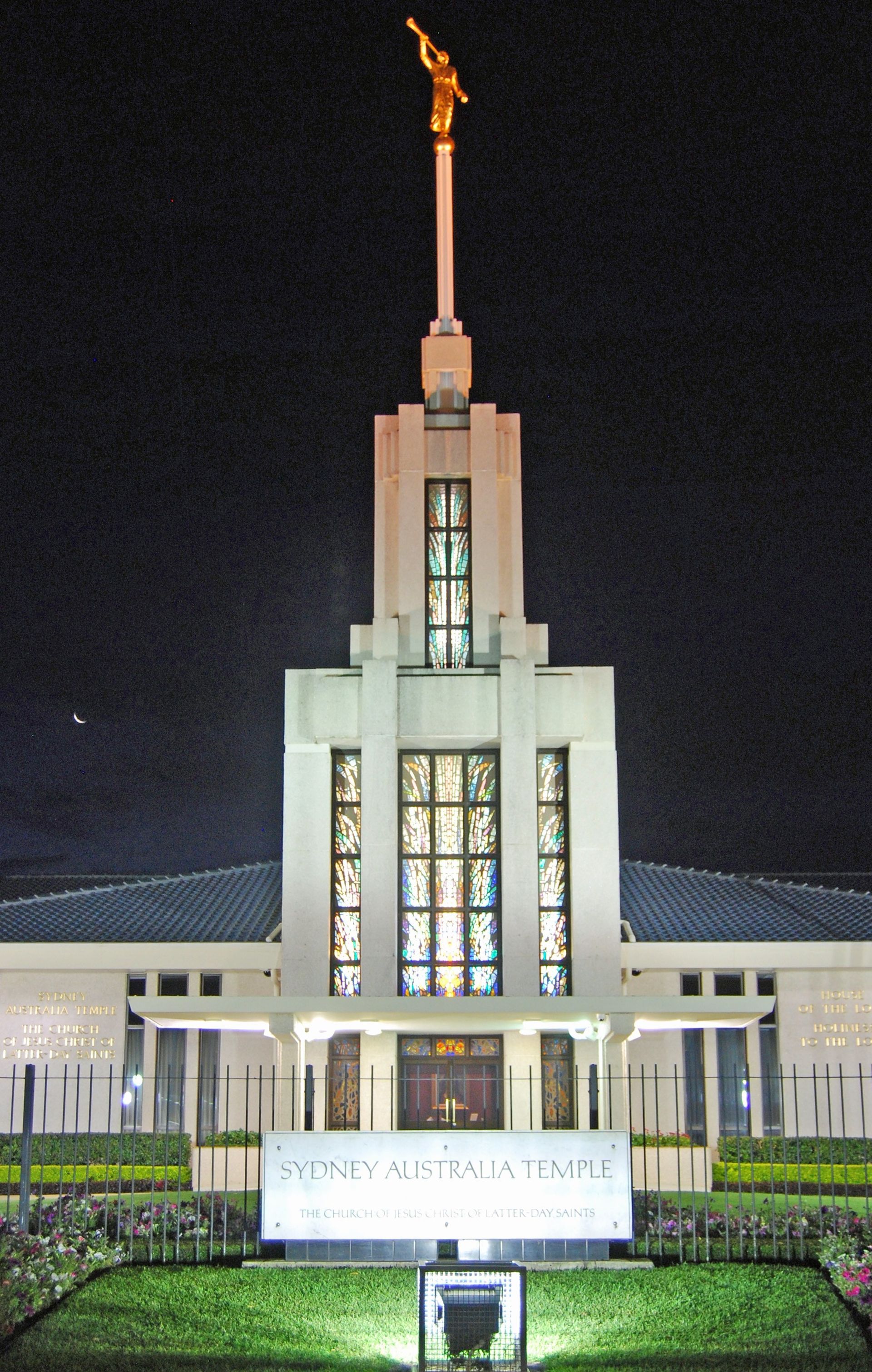 The Sydney Australia Temple, including the name sign, entrance, and scenery.  