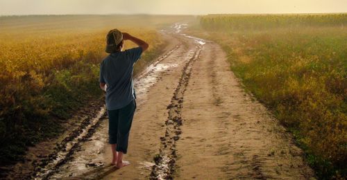 walking down a dirt road