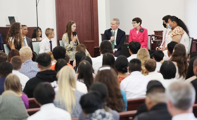 David A. Bednar and Susan Bednar at a Youth Devotional in Guam