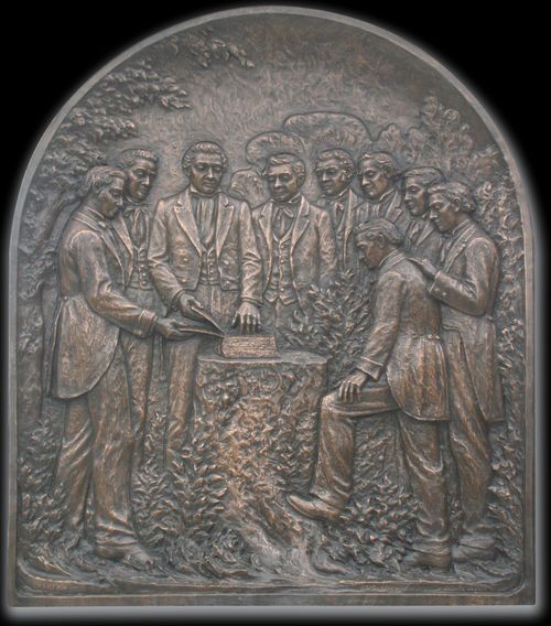 relief carving of Joseph Smith and the Eight Witnesses