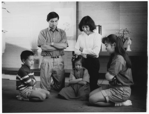 family praying