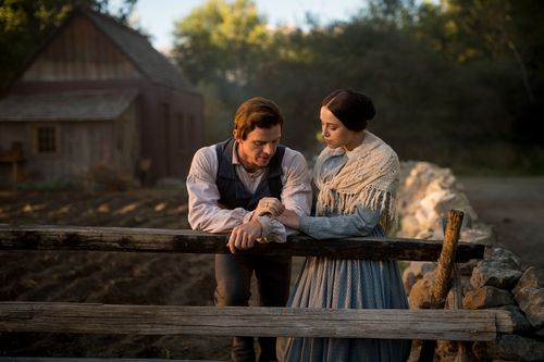 depiction of Joseph and Emma Smith by a fence