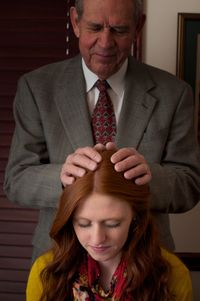 patriarch giving a blessing to a youth