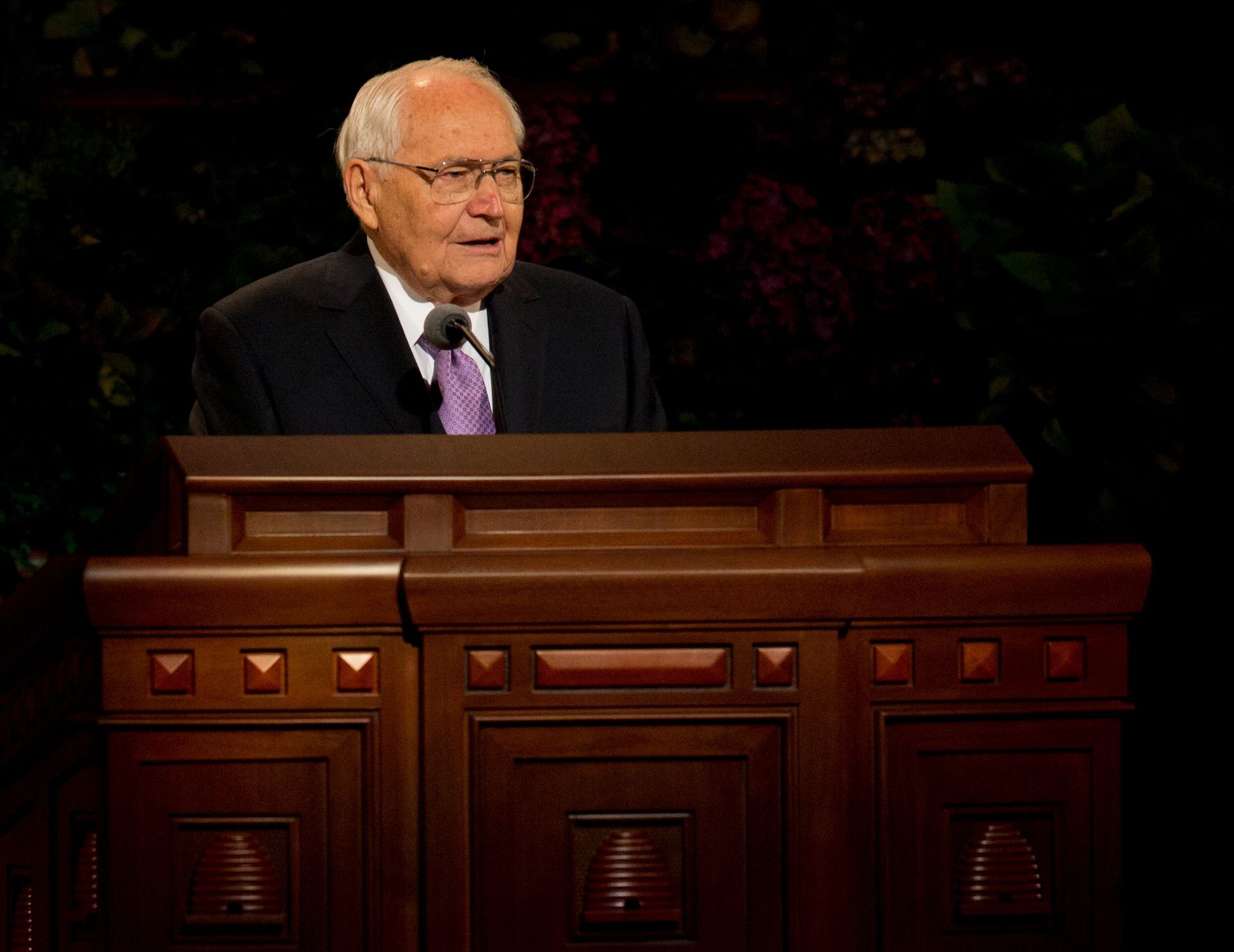 L. Tom Perry standing to speak to the congregation at general conference.