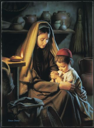 Jesus Christ depicted as a child with his mother Mary. Christ is kneeling beside Mary and resting His clasped hands on Mary's lap. Mary has her head bowed as she and the young Christ pray. There is an oil lamp burning on a table next to the mother and son.