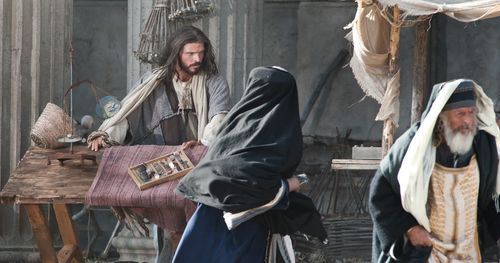 Jesus turning over a table of a money changer in the temple. Outtakes include images of Christ alone and with the crowd of merchants and buyers fleeing, people buying goods, and people looking.