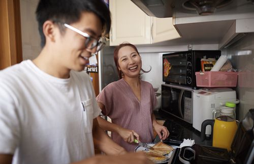 Jason and Jackie cooking