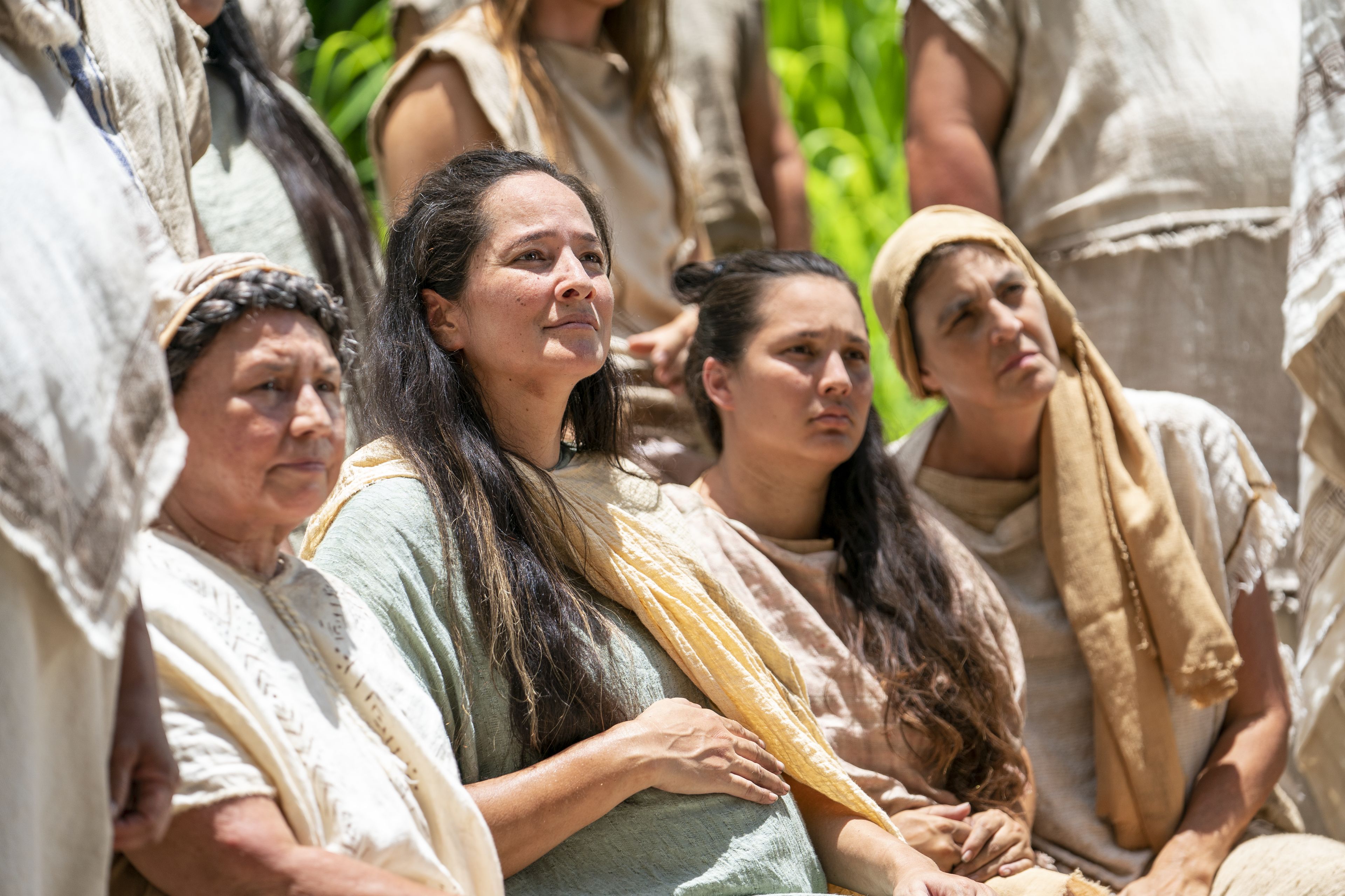 People prepare themselves to be baptized at the Waters of Mormon. They listen to Alma teach and testify.