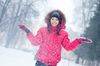 Woman playing in snow