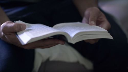 person reading scriptures