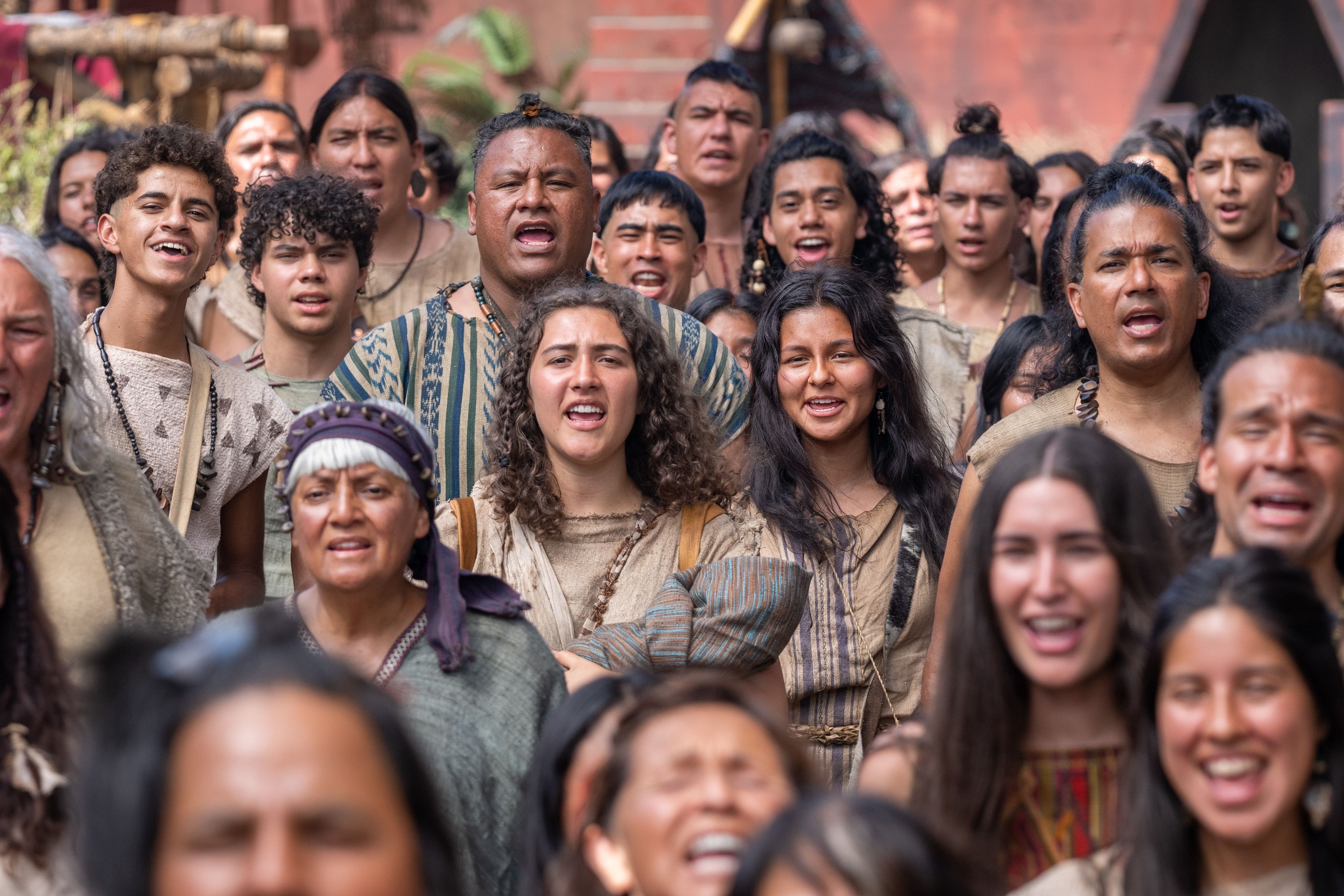 The multitude shouts hosanna to the Lord as Nephites (including Nephi's wife) gather together in the City of Bountiful.