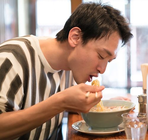 man eating dinner