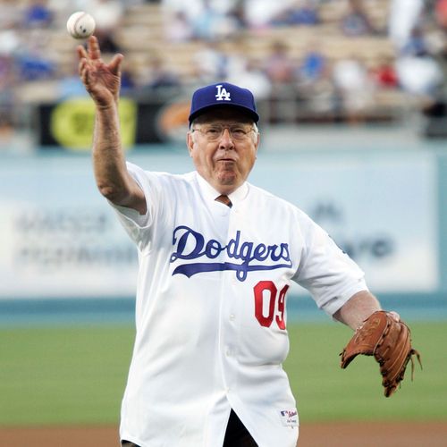 M. Russell Ballard throwing a baseball