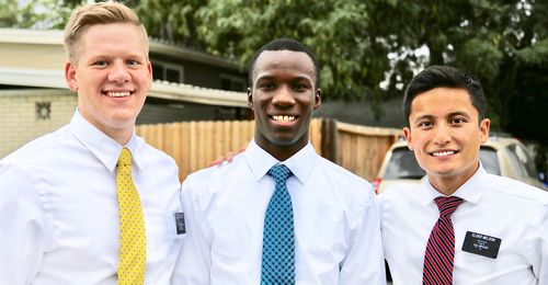 young man with missionaries