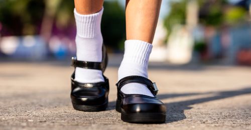 closeup of girl’s feet in shoes