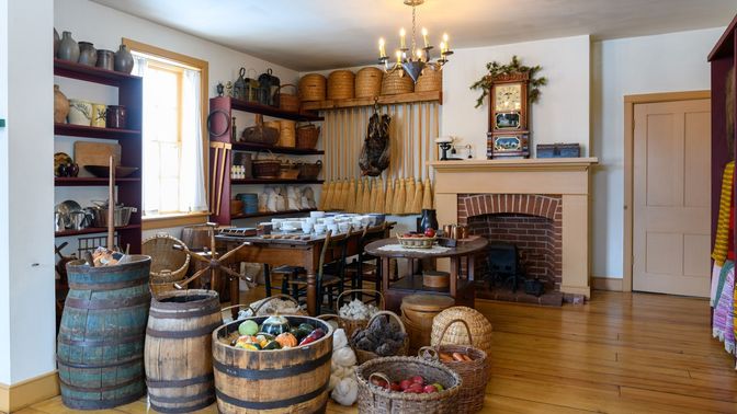 Store interior showing baskets and bins full of goods for sale.