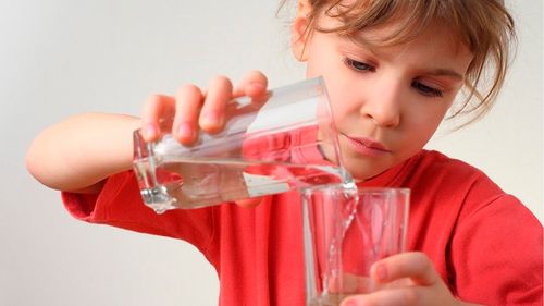 girl pouring water