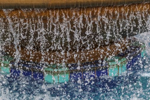 water falling in fountain