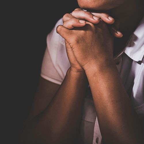 young man praying