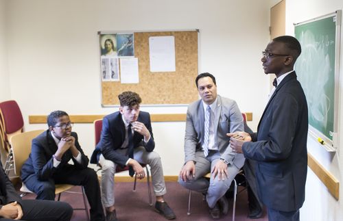 young man teaching