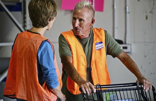 people working in warehouse