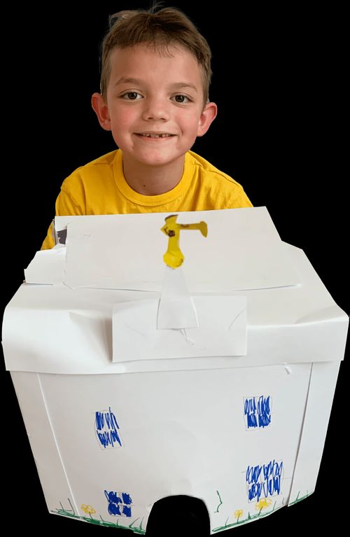 Photo of a boy named Jones Francom with his crafted temple.