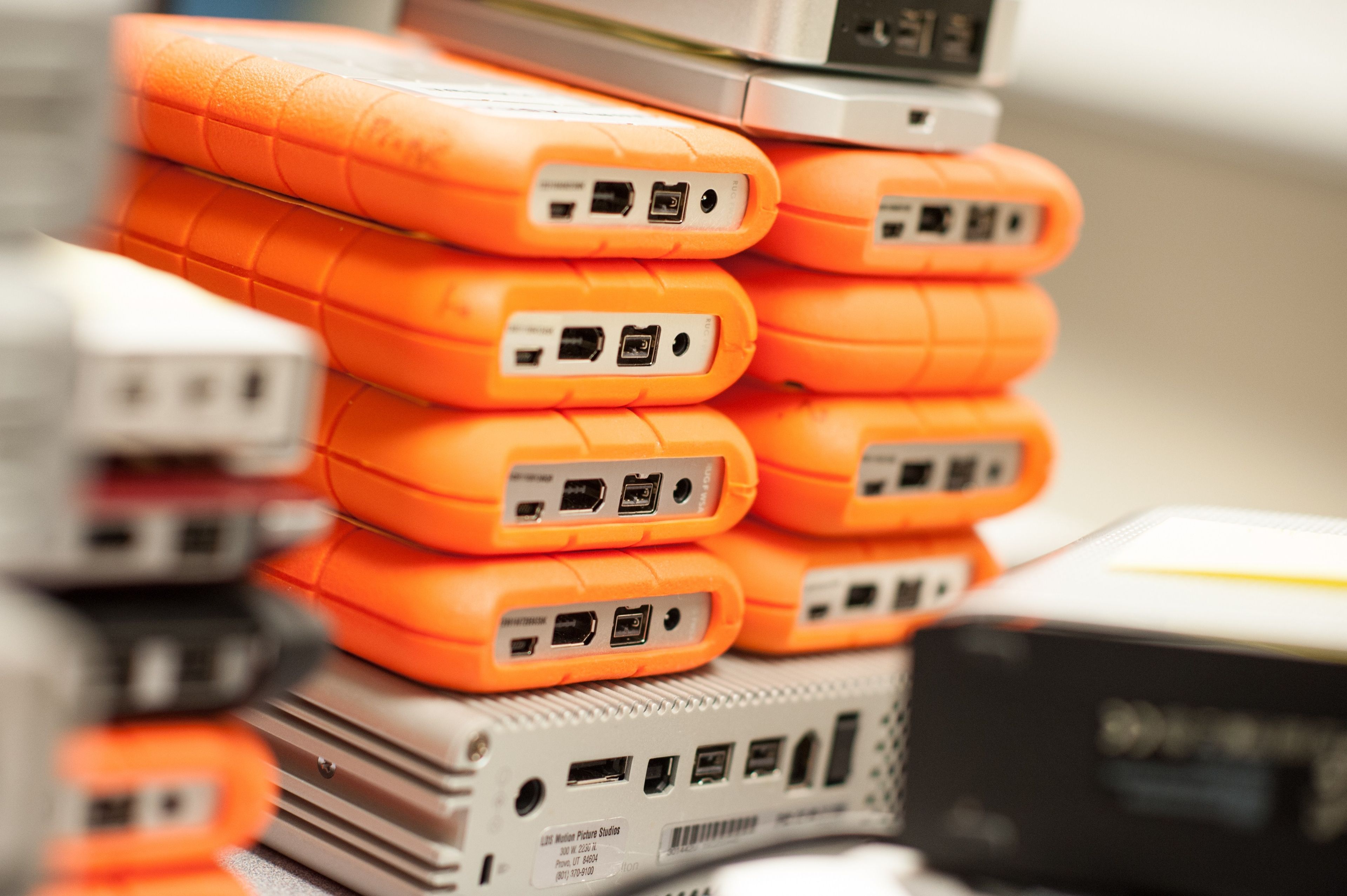 A stack of external hard drives.