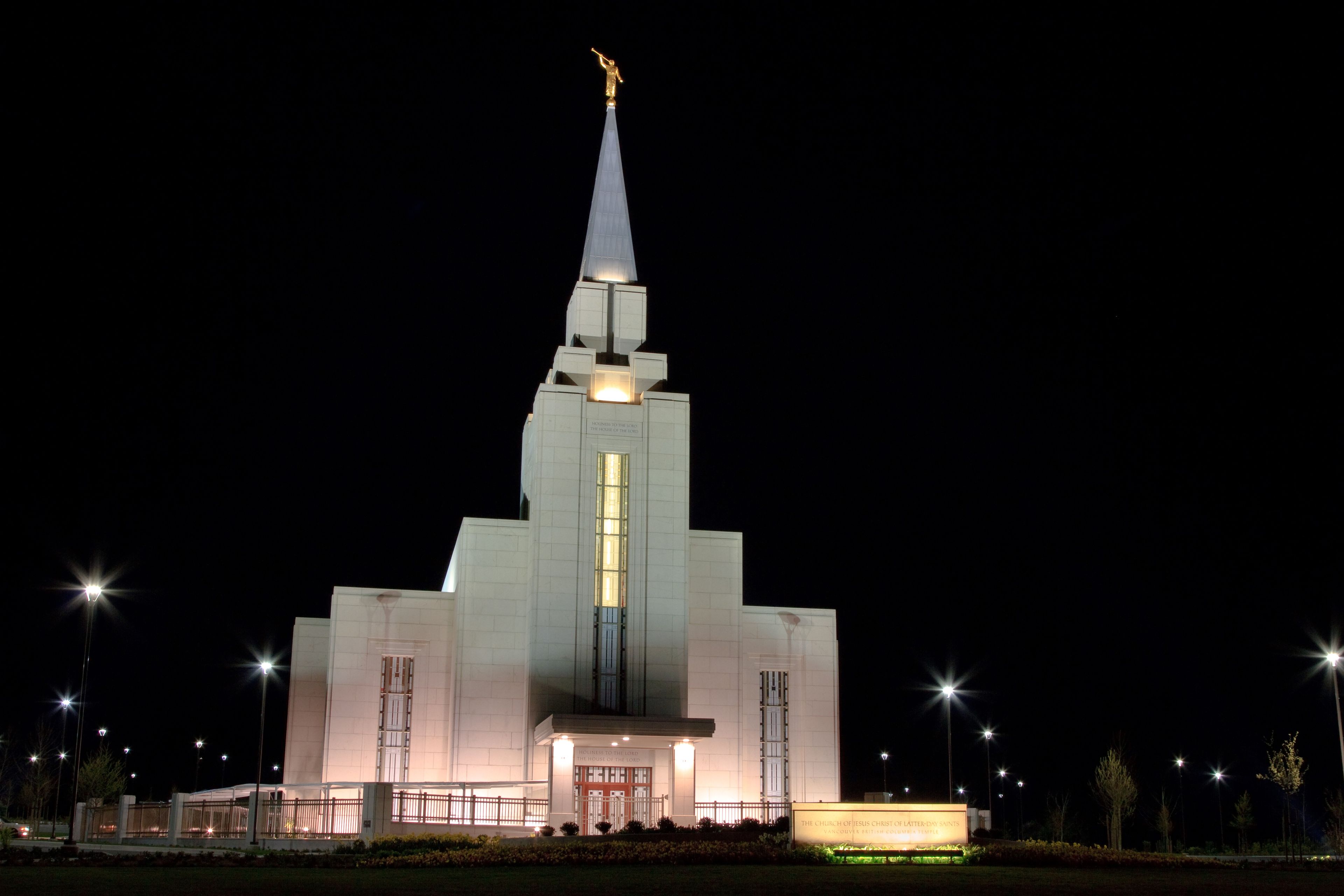 The Vancouver British Columbia Temple in the evening, with the entrance.