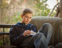 young man reading scriptures