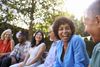 Woman laughing with friends