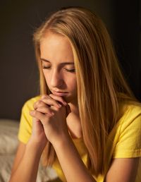 young woman praying