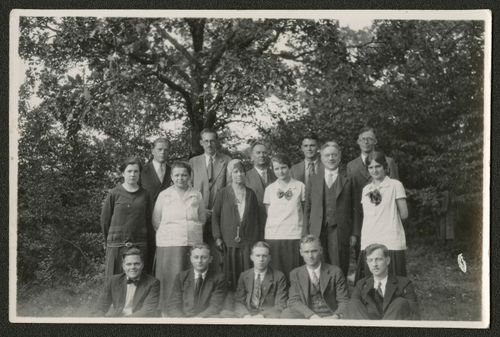 John A. Widtsoe avec des membres